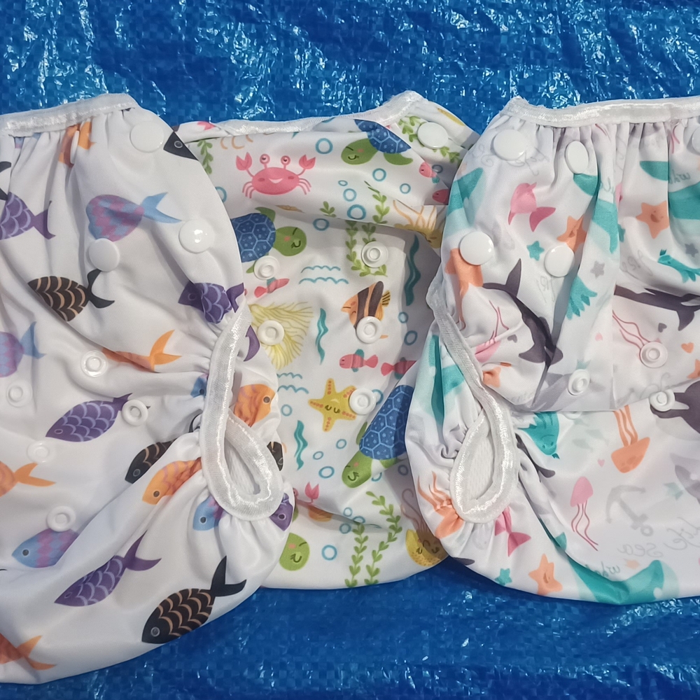 Green and White Diaper Covers with Elastic Edges